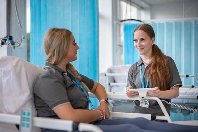 Students working in the recently renovated Health and Fitness Suite, using the two-bedded simulation ward.