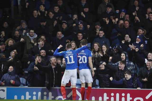 Sean Raggett celebrates scoring against Fleetwood in March 2020 - the last time more than 2,000 fans were allowed into Fratton Park. Picture: Joe Pepler
