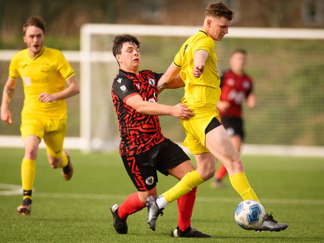 Action from Harvest's 4-1 win at home to Locks Heath (red and black kit) in the Hampshire Premier League. Picture: Keith Woodland (180321-586)