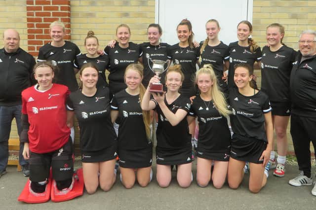 Fareham ladies with their hockey silverware after a 2-1 win over Southampton Picture by Mike Vimpany