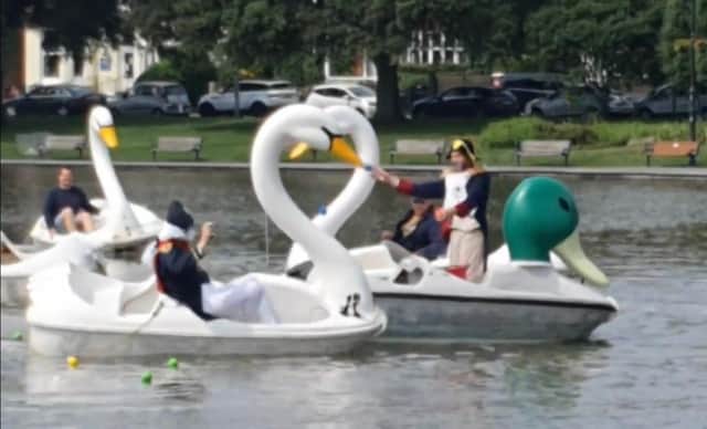 The battle of Canoe Lake - Comedian Al Murray, left, throws a ball at First Dates' host Fred Sirieix, right, from his swan-shaped pedalo in Canoe Lake. Photo: Instagram/Grayinpompey