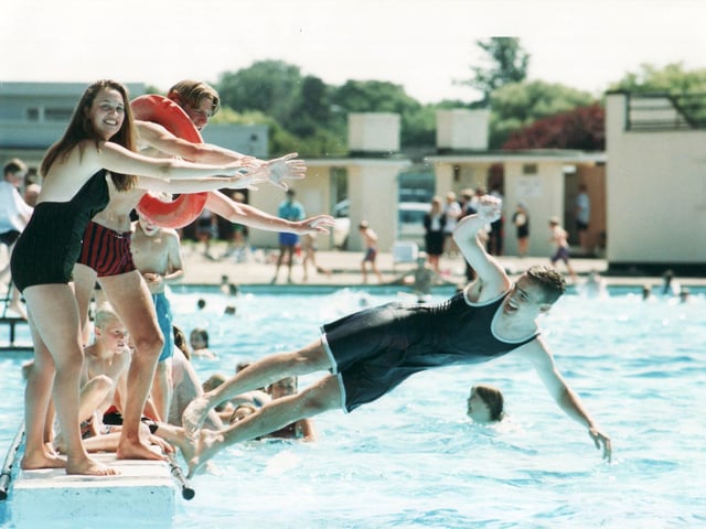 Sorry! A swimmer is pushed into the water in July 1995, as the lido celebrated its 60th anniversary.