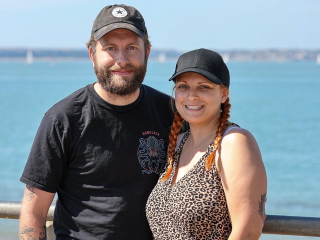 Daniel Barnes and Carly Perren enjoying the sun with their young family. Picture: Alex Shute