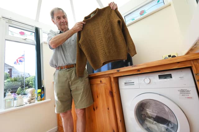 Derek Tolley of Fareham, was bought an expensive jumper by his  wife for Christmas. Despite following the washing instructions, it came out as a 'small' after washing. With the help of the Streetwise team on The News, Mr Tolley has now accepted a refund from the shop Picture: Chris Moorhouse (jpns 210523-04)