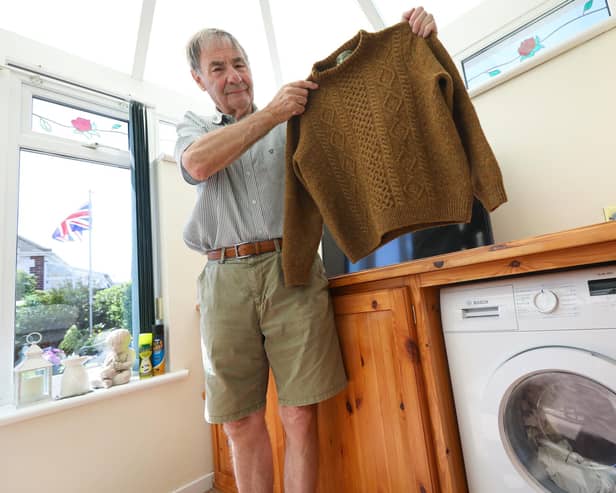 Derek Tolley of Fareham, was bought an expensive jumper by his  wife for Christmas. Despite following the washing instructions, it came out as a 'small' after washing. With the help of the Streetwise team on The News, Mr Tolley has now accepted a refund from the shop Picture: Chris Moorhouse (jpns 210523-04)