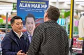 Havant MP Alan Mak talks to a constituent at his latest surgery at the ASDA superstore