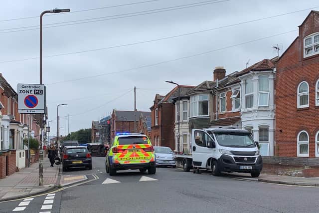 Police attend car on its side in Francis AvenuePic: Denis Brzozowski