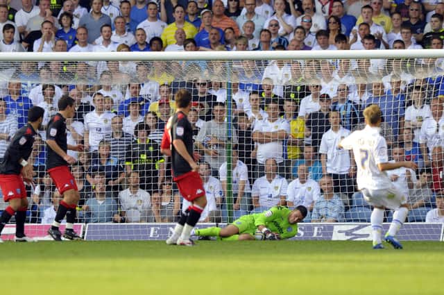 Stephen Henderson makes a save against Leeds on his Pompey league debut in October 2011. Picture: Allan Hutchings