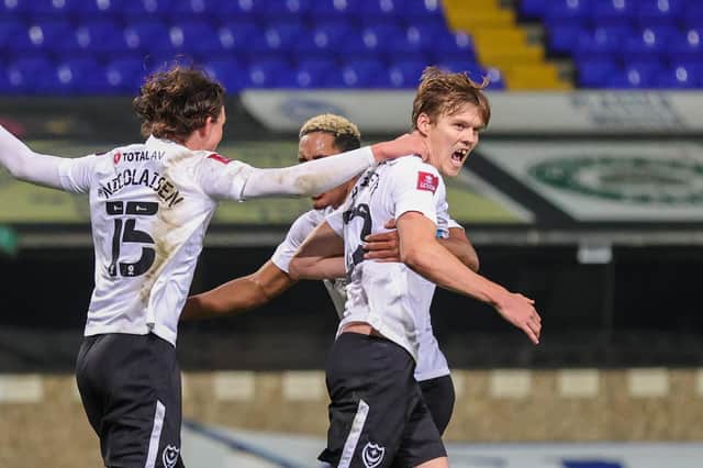 Sean Raggett celebrates his winner at Ipswich. Picture: Nigel Keene