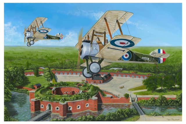 With Fort Brockhurst far below we see a pair of Sopwith Camel biplanes banking overhead. Picture: Neil Marshall