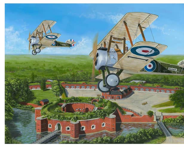 With Fort Brockhurst far below we see a pair of Sopwith Camel biplanes banking overhead. Picture: Neil Marshall
