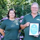 Stubcroft Farm Campsite's managing director Simon Green, centre, with operations manager Michaela Rozborilova, left and  Mark Feast, sustainability and accessibility coordinator, right