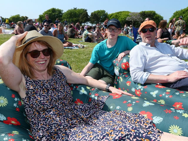 From left, Jo Blanden, Daniel Morey, 11, who was seriously into Van Gosh before they were big, and Steve Morey. Live at the Bandstand, Castle Field, Southsea
Picture: Chris Moorhouse (jpns 270523-41)