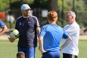 US Portsmouth boss Tom Grice, left. Picture: Keith Woodland