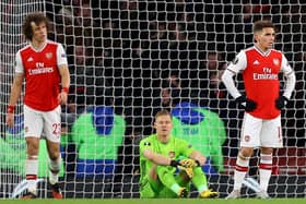 From left: David Luiz, Bernd Leno and Lucas Torreira look dejected after Arsenal conceded a second goal in their Europa League round of 32 second leg match against Olympiacos.  Picture: Julian Finney/Getty Images