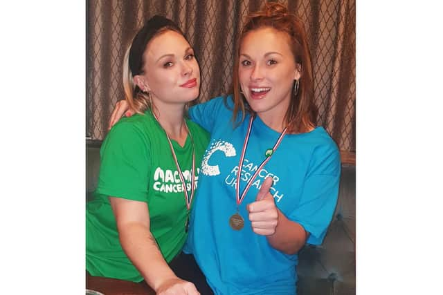 Twins Marcie and Sammie Mayhead ran two miles each day in September to raise funds for Macmillan Cancer Support and Cancer Research UK