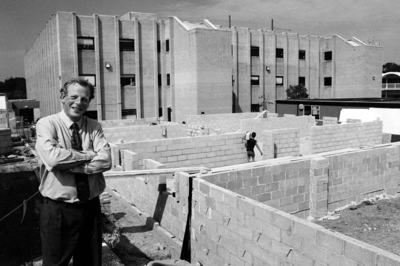 Michael Oakes, Principal of the South Downs College, Havant, in front of the new South building, that is under construction in 1994. The News PP5186