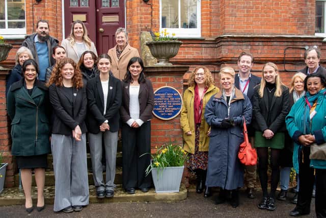 Members of the High School, Head girls team, chair of governors and representatives of the council next to the blue plaque at Portsmouth High School
Picture: Tilly Beresford
