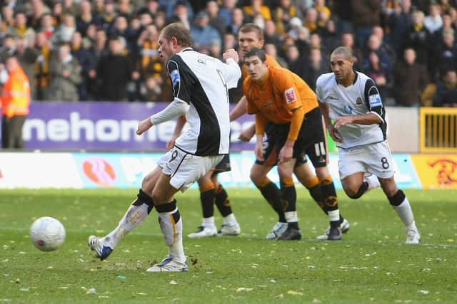 Scott Rendell puts non-league Cambridge United ahead at Championship club Wolves in the third round of the FA Cup in January 2008. Wolves hit back to win 2-1. Photo by Clive Mason/Getty Images.