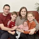 Emma and Stephen Collier from Wickham, have welcomed their third child, a daughter called Iris, who arrived ten days late on Christmas Day weighing 8lb 10oz. 
Pictured is: Stephen and Emma Collier with their three children George (7), Henry (4) and baby Iris who was born on Christmas Day at home.