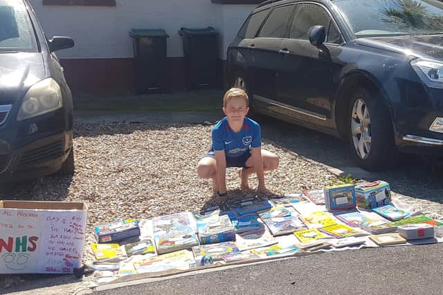Jacob Lee, 9 from Purbrook, has set up his own pop-up shop on his driveway to sell his old books and raise money for the NHS