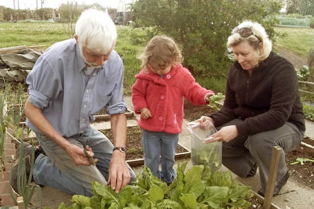 Horticulturalist Goff Gleable with grandaughter Abigail and wife Mary. Picture: Goff Gleadle
