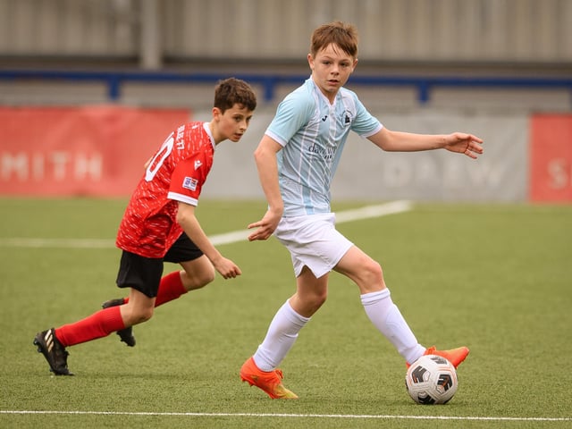 Action from the Portsmouth Youth League Geldard Invitation Cup final between Jubilee 77 U13s and Castle United U13s (light blue and white kit). Picture: Keith Woodland (190321-454)