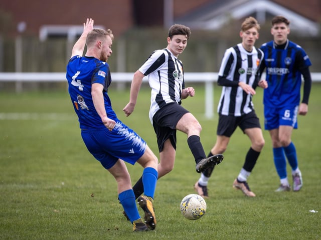 Hayling United (black/white) v Clanfield. Picture by Alex Shute