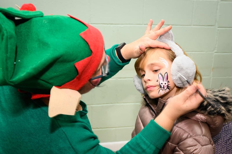 Evangeline Crook, 8 gets her face painted at the Wickham Christmas Fayre