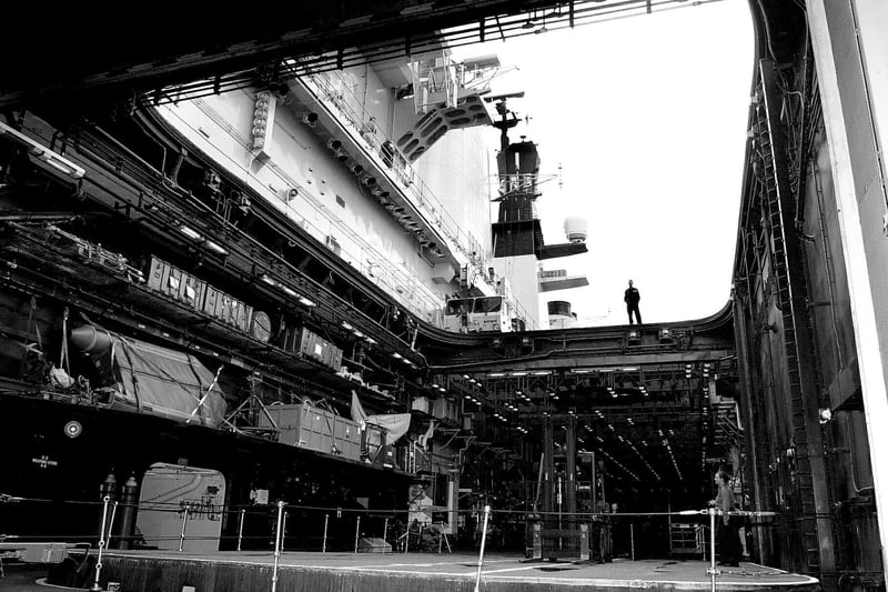 2001. Preparations take place in the hanger of HMS Illustrious before she is deployed to Oman. Picture: Luke MacGregor 014600-1