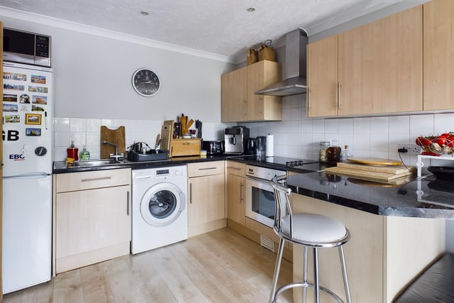 It's open-plan living-kitchen area gives the flat, near the heart of Portsmouth, an airy feeling.