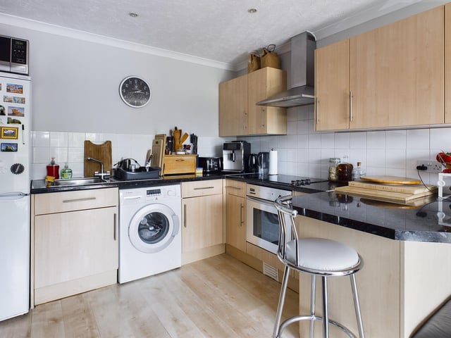 It's open-plan living-kitchen area gives the flat, near the heart of Portsmouth, an airy feeling.
