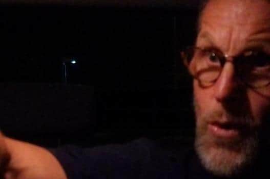 Police are hunting for this man after a taxi driver was racially abused