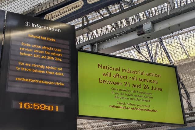 An information board inside Portsmouth and Southsea railway station.