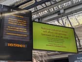 An information board inside Portsmouth and Southsea railway station.