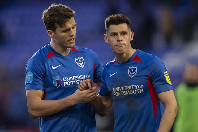 Sean Raggett and James Bolton featured in central defence in Pompey's final game against Fleetwood before lockdown. Picture: Daniel Chesterton/phcimages.com