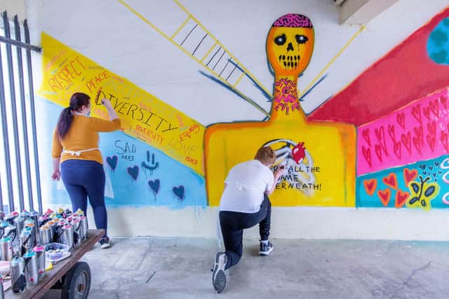 Harbour School pupils working on the mural. Picture: Habibur Rahman