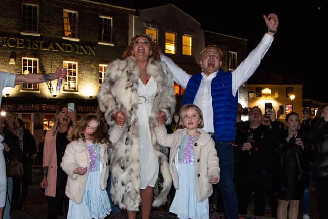 Chloe celebrating the reveal with her daughter's Rosie and Mavie. Picture: Emma Terraciano