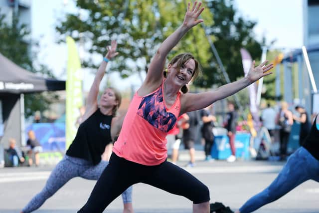 Stretch class. Sweat Fitness Festival, Gunwharf Quays. Picture: Chris Moorhouse (jpns 180921-28)