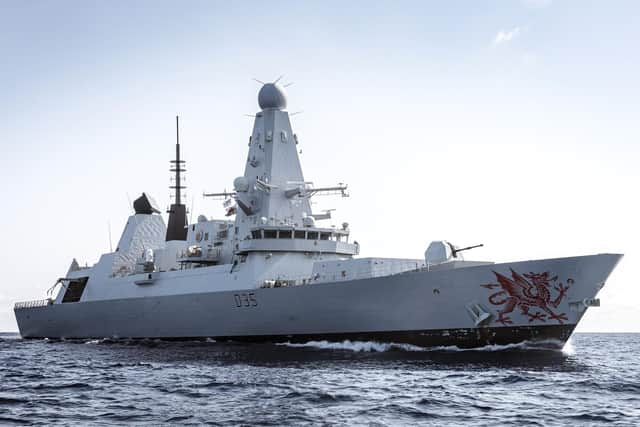 Photograph of HMS Dragon at sea.