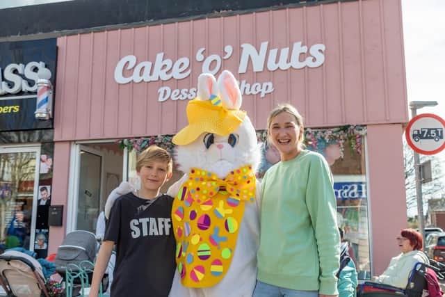Party time at the Cake'o'Nuts one-year anniversary party in Cosham. Pictured: Maximus Butcher (11), Easter Bunny and shop owner Hollie Butcher (35). Picture: Mike Cooter (08042023)