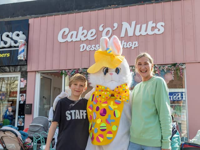 Party time at the Cake'o'Nuts one-year anniversary party in Cosham. Pictured: Maximus Butcher (11), Easter Bunny and shop owner Hollie Butcher (35). Picture: Mike Cooter (08042023)