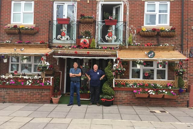 Phil Wicker (left) and Les Carstairs outside their D-Day garden in Highland Road, Southsea