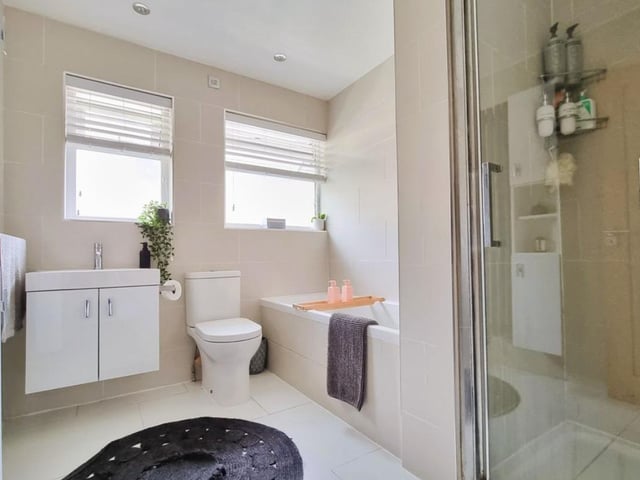 The listing says: "The accommodation is arranged over two floors and comprises: Hallway, living room, 30’ open plan kitchen incorporating dining room, utility area, cloakroom and integral garage on the ground floor and four bedrooms, en-suite room (unfitted) and family bathroom on the first floor. "