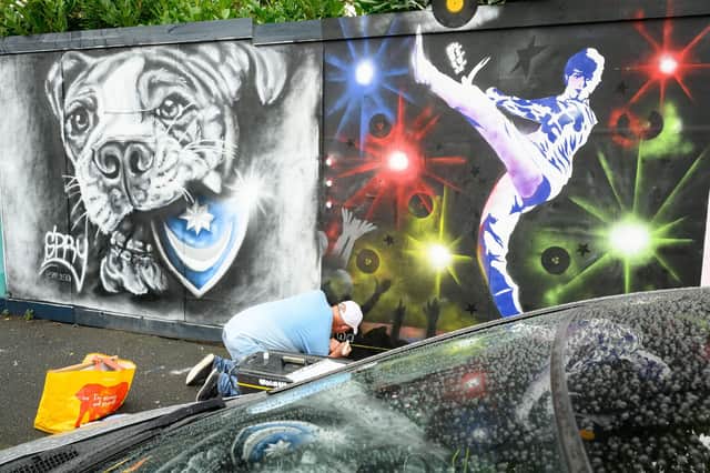 Pictured is: Another artist at work
Picture: Keith Woodland (100921-30)