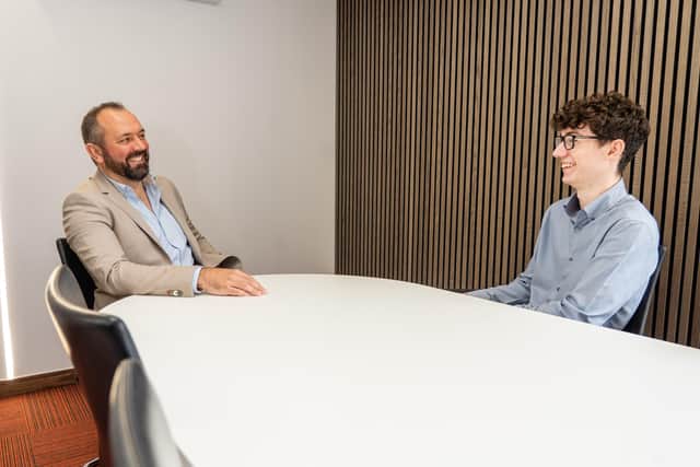 Mark Abrams and Will Lancaster at his new apprenticeship at Interpro Technology Solutions. Photo by Matthew Clark
