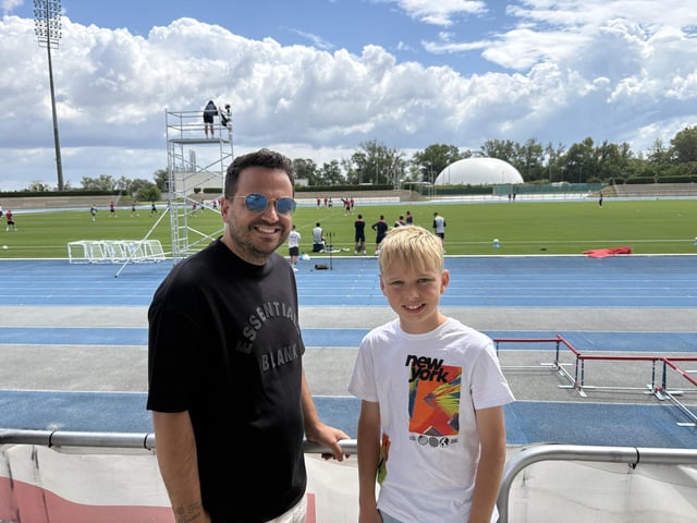 Dean Bowden, aged 38 from Chichester, and Ralph Bowden, aged 13 from Chichester, at Pompey's open training session at the X-Bionic Sphere Sports Centre in Šamorín, Slovakia.