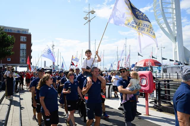 The crews arrive at Gunwharf to meet their families.Picture: Keith Woodland (270721-109)