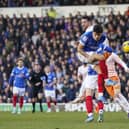 Alex Robertson sends a far-post header wide of the target in the first half of Pompey's clash with Blackpool. Picture: Jason Brown/ProSportsImages