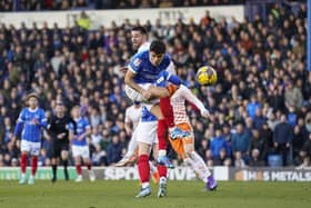 Alex Robertson sends a far-post header wide of the target in the first half of Pompey's clash with Blackpool. Picture: Jason Brown/ProSportsImages